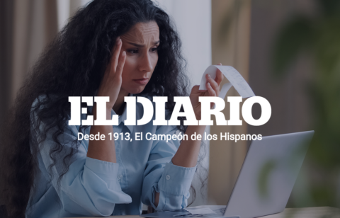 Person reviewing credit card statements and household finances